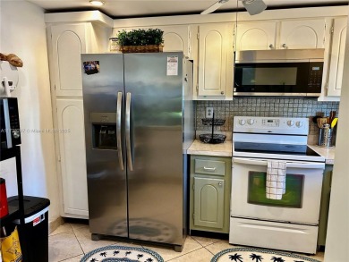 Beautiful first-floor unit featuring 1 bedroom and 1.5 bathrooms on Hollybrook Golf and Tennis Club  in Florida - for sale on GolfHomes.com, golf home, golf lot
