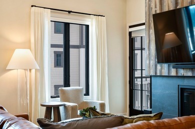 Experience elevated mountain living in this 2 bed, 2.5 bath, 1 on Osprey Meadows at Tamarack Resort in Idaho - for sale on GolfHomes.com, golf home, golf lot