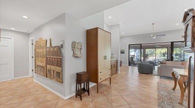 Lakefront villa that lives like a home, but without the hassle on The Meadows Golf and Country Club in Florida - for sale on GolfHomes.com, golf home, golf lot