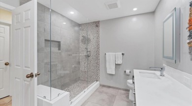 Lakefront villa that lives like a home, but without the hassle on The Meadows Golf and Country Club in Florida - for sale on GolfHomes.com, golf home, golf lot