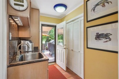 Lovely raised Acadian cottage on an oversized lot fronting the on Covington Country Club in Louisiana - for sale on GolfHomes.com, golf home, golf lot