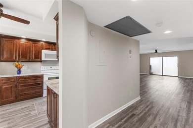 PRICED TO SELL! Spacious IRIS 2 bed 2 bath model lovingly on Wynmoor Golf Course in Florida - for sale on GolfHomes.com, golf home, golf lot