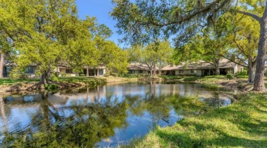 Lakefront villa that lives like a home, but without the hassle on The Meadows Golf and Country Club in Florida - for sale on GolfHomes.com, golf home, golf lot