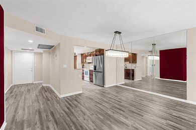 PRICED TO SELL! Spacious IRIS 2 bed 2 bath model lovingly on Wynmoor Golf Course in Florida - for sale on GolfHomes.com, golf home, golf lot