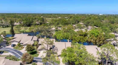 Lakefront villa that lives like a home, but without the hassle on The Meadows Golf and Country Club in Florida - for sale on GolfHomes.com, golf home, golf lot