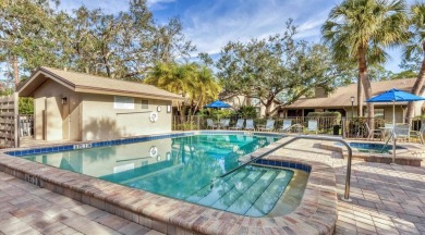 Lakefront villa that lives like a home, but without the hassle on The Meadows Golf and Country Club in Florida - for sale on GolfHomes.com, golf home, golf lot