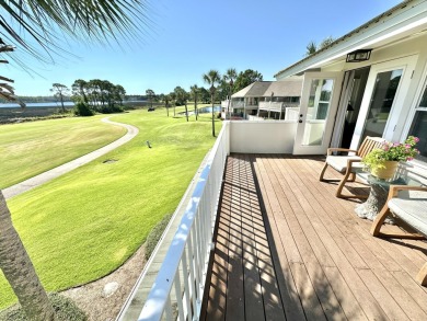 Enjoy Sandestin living in this pristine townhome that overlooks on Sandestin Golf and Beach Resort - The Links in Florida - for sale on GolfHomes.com, golf home, golf lot