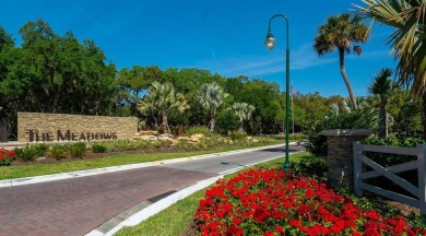 Lakefront villa that lives like a home, but without the hassle on The Meadows Golf and Country Club in Florida - for sale on GolfHomes.com, golf home, golf lot