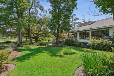 Lovely raised Acadian cottage on an oversized lot fronting the on Covington Country Club in Louisiana - for sale on GolfHomes.com, golf home, golf lot