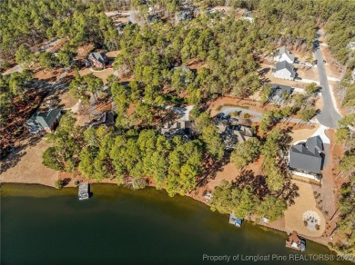 Architecturally designed waterfront home on a quiet, beautiful on Deercroft Golf and Country Club in North Carolina - for sale on GolfHomes.com, golf home, golf lot