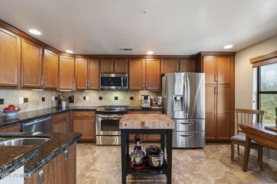 This stunning unit is in the perfect location overlooking the on Wildfire Golf Club in Arizona - for sale on GolfHomes.com, golf home, golf lot