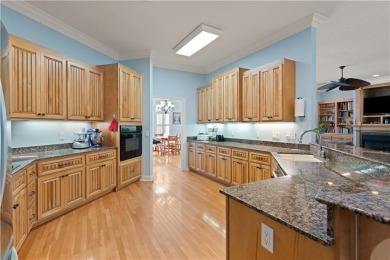 Nestled on a picturesque half-acre lot on the desirable Oak on Oak Grove Island Golf and Country Club in Georgia - for sale on GolfHomes.com, golf home, golf lot