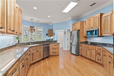 Nestled on a picturesque half-acre lot on the desirable Oak on Oak Grove Island Golf and Country Club in Georgia - for sale on GolfHomes.com, golf home, golf lot