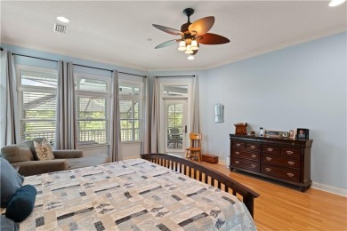 Nestled on a picturesque half-acre lot on the desirable Oak on Oak Grove Island Golf and Country Club in Georgia - for sale on GolfHomes.com, golf home, golf lot