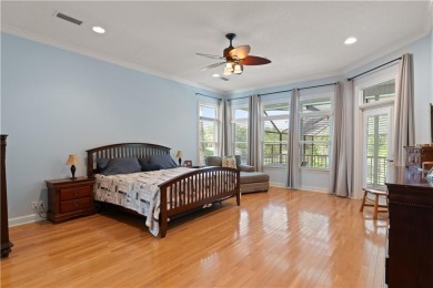 Nestled on a picturesque half-acre lot on the desirable Oak on Oak Grove Island Golf and Country Club in Georgia - for sale on GolfHomes.com, golf home, golf lot