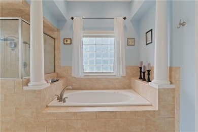 Nestled on a picturesque half-acre lot on the desirable Oak on Oak Grove Island Golf and Country Club in Georgia - for sale on GolfHomes.com, golf home, golf lot