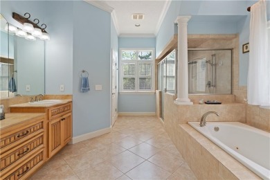 Nestled on a picturesque half-acre lot on the desirable Oak on Oak Grove Island Golf and Country Club in Georgia - for sale on GolfHomes.com, golf home, golf lot