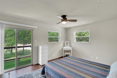 Well-maintained home located in the gated golf course community on De Cordova Bend Country Club in Texas - for sale on GolfHomes.com, golf home, golf lot