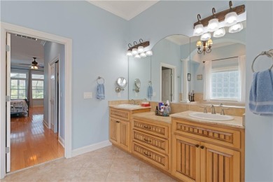 Nestled on a picturesque half-acre lot on the desirable Oak on Oak Grove Island Golf and Country Club in Georgia - for sale on GolfHomes.com, golf home, golf lot