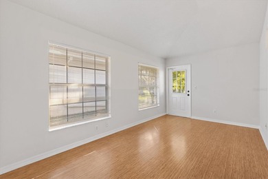 COMPLETELY REFRESHED - NEW ROOF BEING INSTALLED, Move-In Ready on Monarch At Royal Highlands in Florida - for sale on GolfHomes.com, golf home, golf lot