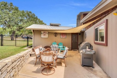 Well-maintained home located in the gated golf course community on De Cordova Bend Country Club in Texas - for sale on GolfHomes.com, golf home, golf lot