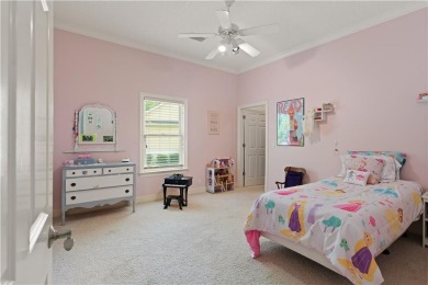 Nestled on a picturesque half-acre lot on the desirable Oak on Oak Grove Island Golf and Country Club in Georgia - for sale on GolfHomes.com, golf home, golf lot