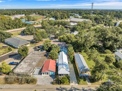 This charming cottage and guest house on the second block of on The Bridges Golf Club At Hollywood Casino in Mississippi - for sale on GolfHomes.com, golf home, golf lot