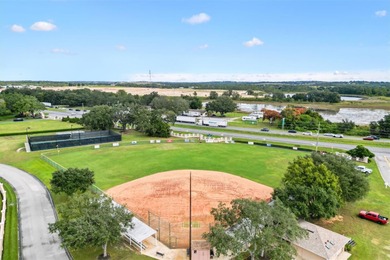 COMPLETELY REFRESHED - NEW ROOF BEING INSTALLED, Move-In Ready on Monarch At Royal Highlands in Florida - for sale on GolfHomes.com, golf home, golf lot