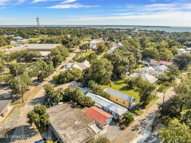 This charming cottage and guest house on the second block of on The Bridges Golf Club At Hollywood Casino in Mississippi - for sale on GolfHomes.com, golf home, golf lot