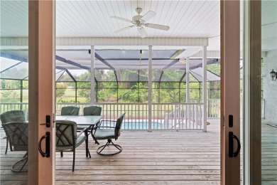 Nestled on a picturesque half-acre lot on the desirable Oak on Oak Grove Island Golf and Country Club in Georgia - for sale on GolfHomes.com, golf home, golf lot