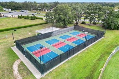 COMPLETELY REFRESHED - NEW ROOF BEING INSTALLED, Move-In Ready on Monarch At Royal Highlands in Florida - for sale on GolfHomes.com, golf home, golf lot