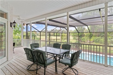Nestled on a picturesque half-acre lot on the desirable Oak on Oak Grove Island Golf and Country Club in Georgia - for sale on GolfHomes.com, golf home, golf lot