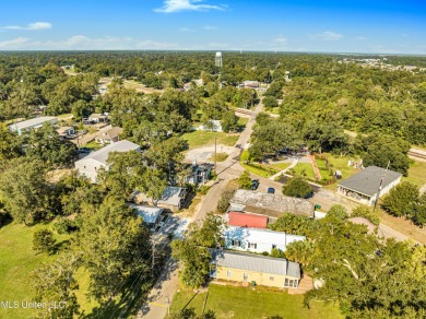 This charming cottage and guest house on the second block of on The Bridges Golf Club At Hollywood Casino in Mississippi - for sale on GolfHomes.com, golf home, golf lot