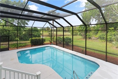 Nestled on a picturesque half-acre lot on the desirable Oak on Oak Grove Island Golf and Country Club in Georgia - for sale on GolfHomes.com, golf home, golf lot