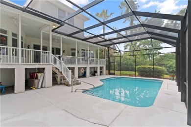 Nestled on a picturesque half-acre lot on the desirable Oak on Oak Grove Island Golf and Country Club in Georgia - for sale on GolfHomes.com, golf home, golf lot