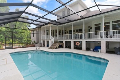 Nestled on a picturesque half-acre lot on the desirable Oak on Oak Grove Island Golf and Country Club in Georgia - for sale on GolfHomes.com, golf home, golf lot