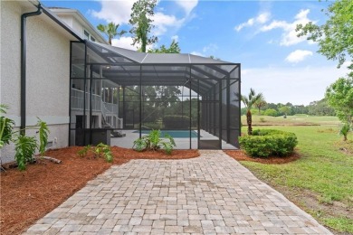Nestled on a picturesque half-acre lot on the desirable Oak on Oak Grove Island Golf and Country Club in Georgia - for sale on GolfHomes.com, golf home, golf lot