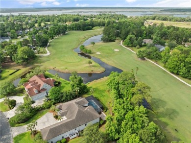 Nestled on a picturesque half-acre lot on the desirable Oak on Oak Grove Island Golf and Country Club in Georgia - for sale on GolfHomes.com, golf home, golf lot