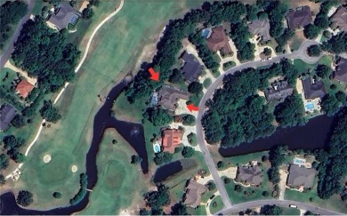 Nestled on a picturesque half-acre lot on the desirable Oak on Oak Grove Island Golf and Country Club in Georgia - for sale on GolfHomes.com, golf home, golf lot