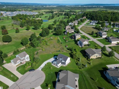 Tucked at the end of a quiet cul-de-sac in Verndale Estates, 872 on Elmbrook Golf Course in Michigan - for sale on GolfHomes.com, golf home, golf lot