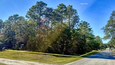 Beautiful wooded lot located near the Neuse River & Minnesott on Minnesott Golf and Country Club in North Carolina - for sale on GolfHomes.com, golf home, golf lot