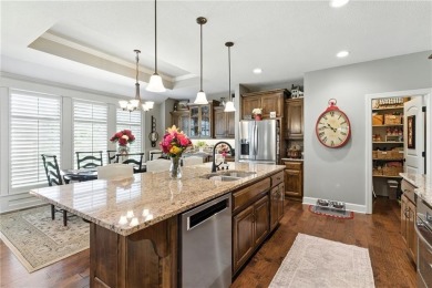 Step into luxury with this stunning reverse 1 1/2 -story home on Prairie Highlands Golf Course in Kansas - for sale on GolfHomes.com, golf home, golf lot
