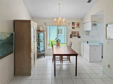 Welcome home to this delightful 2-bedroom, 2-bath villa that on Scepter Golf Club in Florida - for sale on GolfHomes.com, golf home, golf lot