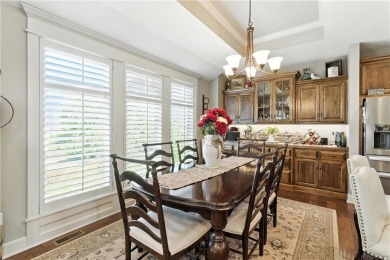 Step into luxury with this stunning reverse 1 1/2 -story home on Prairie Highlands Golf Course in Kansas - for sale on GolfHomes.com, golf home, golf lot