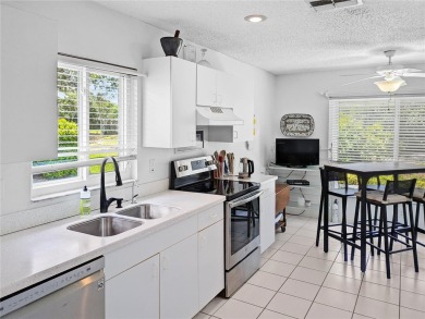 Welcome home to this delightful 2-bedroom, 2-bath villa that on Scepter Golf Club in Florida - for sale on GolfHomes.com, golf home, golf lot
