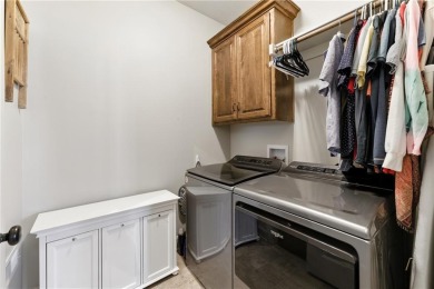 Step into luxury with this stunning reverse 1 1/2 -story home on Prairie Highlands Golf Course in Kansas - for sale on GolfHomes.com, golf home, golf lot