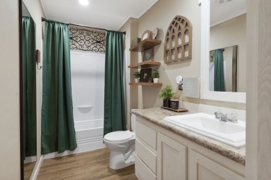 Modern Elegance meets Southern Comfort in this pristine 2022 on Rayburn Country Club in Texas - for sale on GolfHomes.com, golf home, golf lot