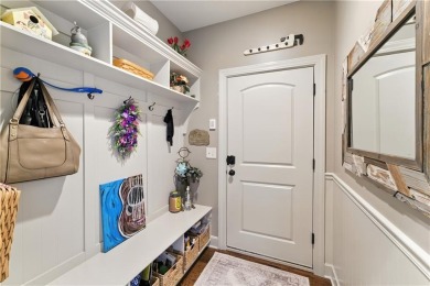 Step into luxury with this stunning reverse 1 1/2 -story home on Prairie Highlands Golf Course in Kansas - for sale on GolfHomes.com, golf home, golf lot