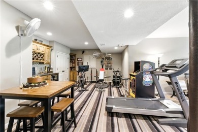 Step into luxury with this stunning reverse 1 1/2 -story home on Prairie Highlands Golf Course in Kansas - for sale on GolfHomes.com, golf home, golf lot