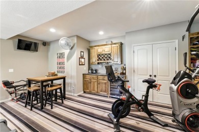 Step into luxury with this stunning reverse 1 1/2 -story home on Prairie Highlands Golf Course in Kansas - for sale on GolfHomes.com, golf home, golf lot